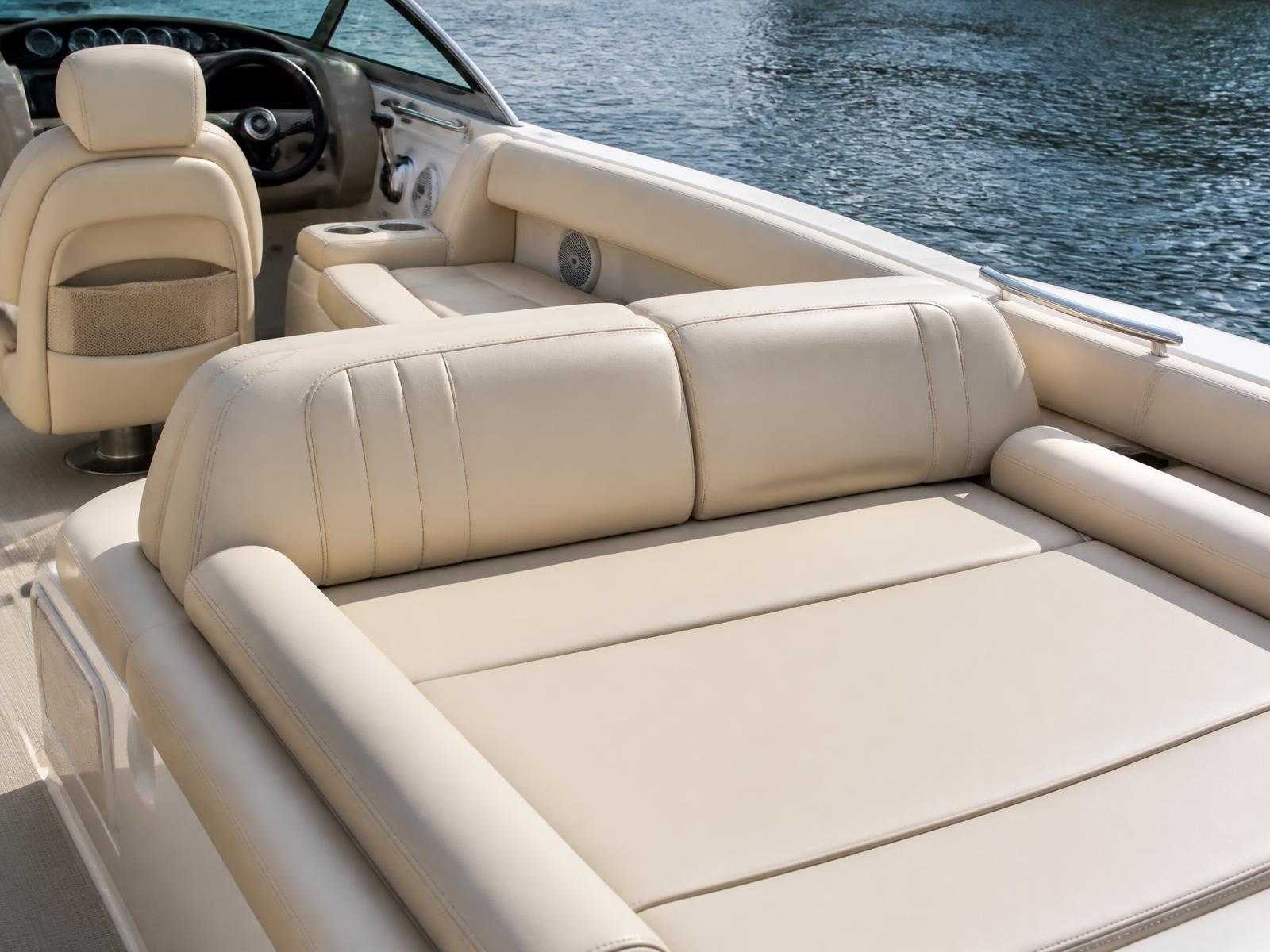 Illustrative close view of clean marine vinyl seating and cockpit surfaces on a boat